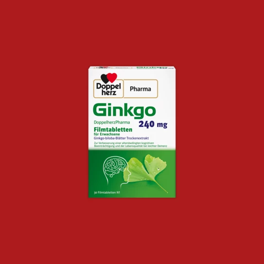 Doppelherzpharma Ginkgo 240 mg Filmtabletten Produkt auf rotem Hintergrund